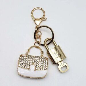 100% Auth Louis Vuitton Lock & Key with unbranded Bagcharm, Keycharm, Keychain